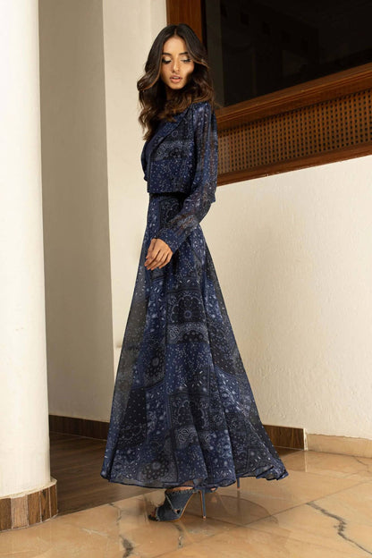 Blue velour maxi dress with long sleeves and fitted waist, full flared skirt
