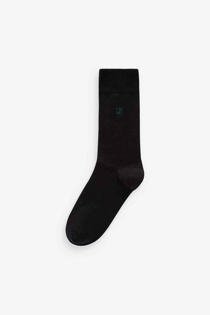 Black crew sock with colored logo marker on the cuff