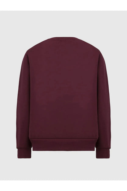 Maroon crewneck sweatshirt back view, ribbed cuffs and hem