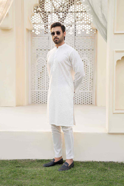 White long kurta with stand collar and textured geometric embroidery, worn with light pants