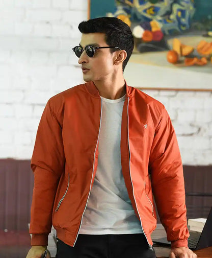 Rust-orange bomber jacket with zip front and stand collar detail