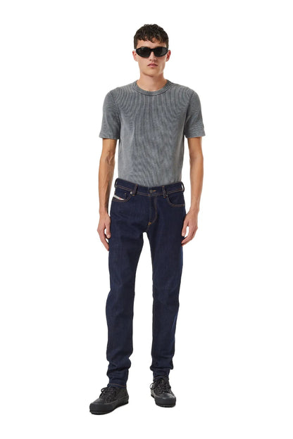 Dark blue denim jeans front view, slim straight leg with five pockets