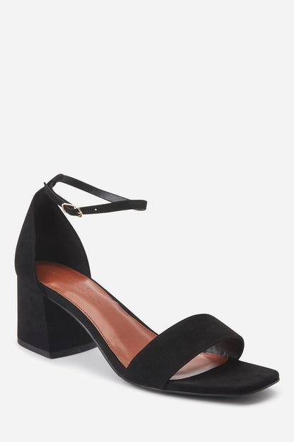 Black open-toe heeled sandal with wide ankle strap and block heel