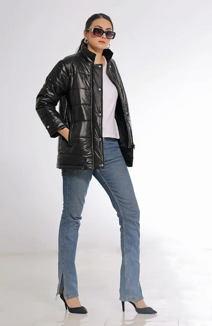 Black quilted puffer jacket with snap buttons and stand collar