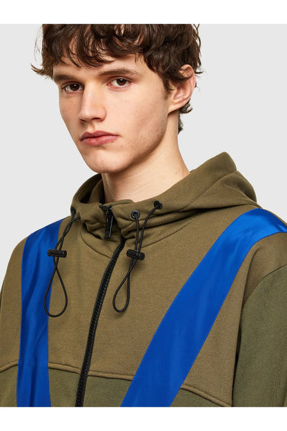 Diesel green hoodie close-up with hood drawstrings and blue diagonal stripe panel
