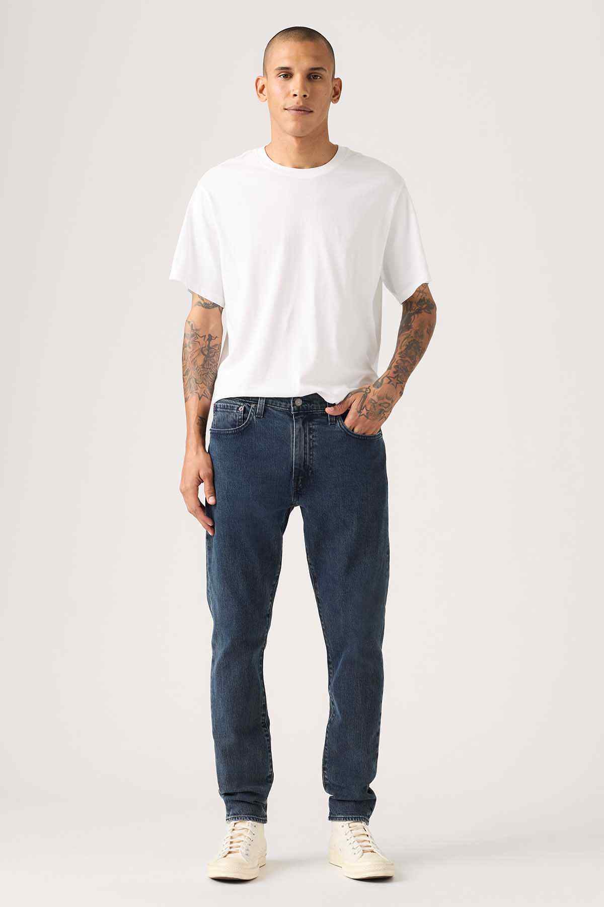 Levi's dark blue straight jeans with belt loops and button fly