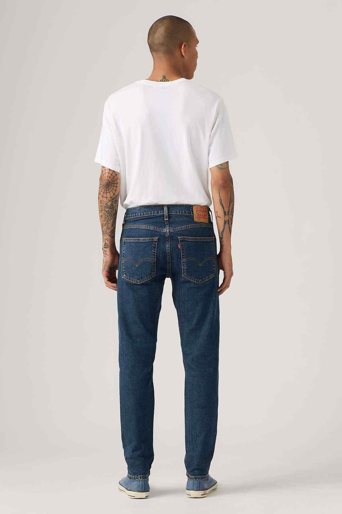 Denim jeans, dark blue wash with back pockets and belt loops