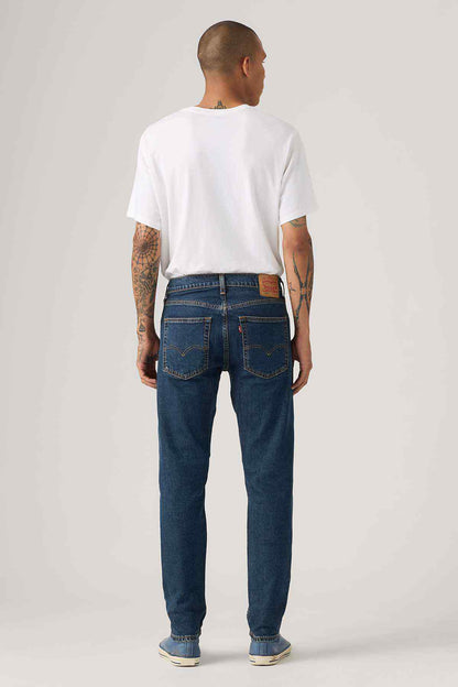 Denim jeans, dark blue wash with back pockets and belt loops
