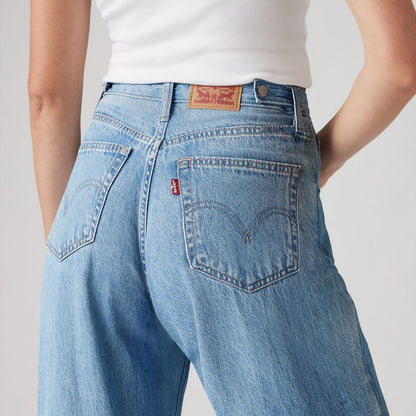 Levi's blue denim jeans close-up of waistband patch and front pockets