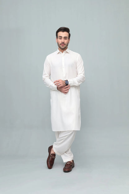 Men's white shalwar suit with long buttoned kurta, front full-body view