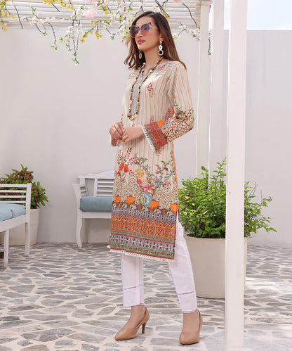 Long tunic with vertical stripe pattern, orange border cuffs, floral hem detail