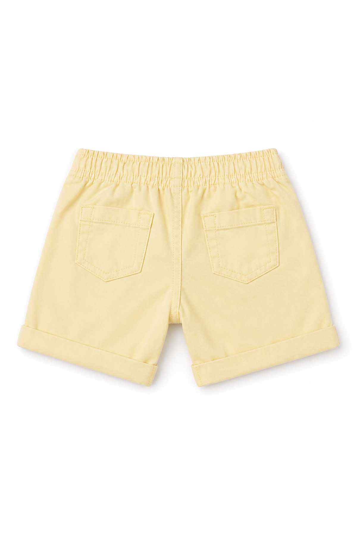 Yellow baby shorts with elastic waistband and two back pockets