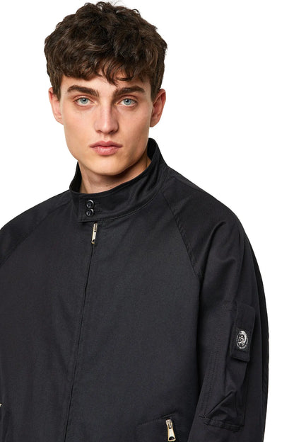 Diesel black zip-front bomber jacket with mock neck and sleeve patch detail