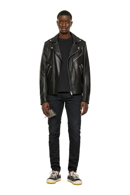 Black leather biker jacket with stand collar, zip pockets, worn with dark jeans