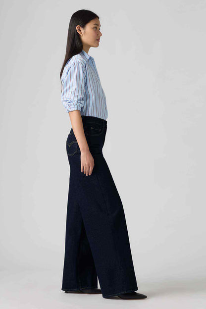 Levi's dark indigo wide-leg jeans shown from the side with belt loops