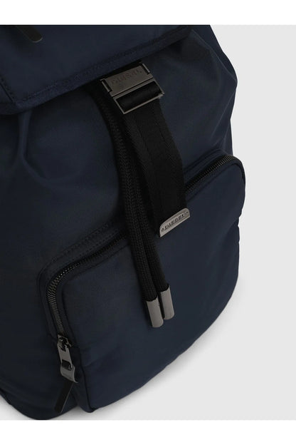 Navy backpack side view with zip pocket, webbing strap, and metal zipper pulls
