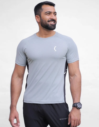 Men's athletic t-shirt, light gray front with black side panels; curved chest logo