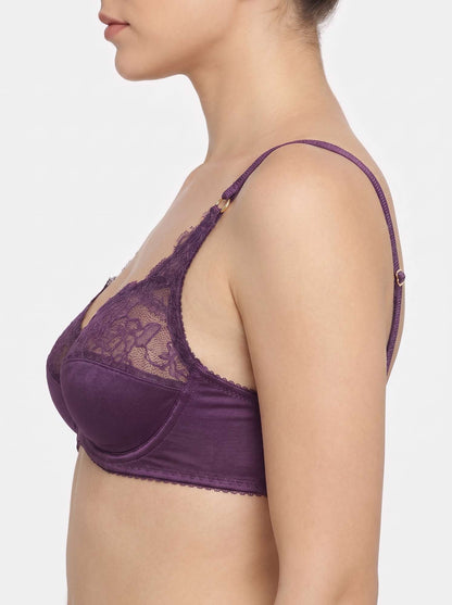 Women's purple lace-trim bra from side view with adjustable straps