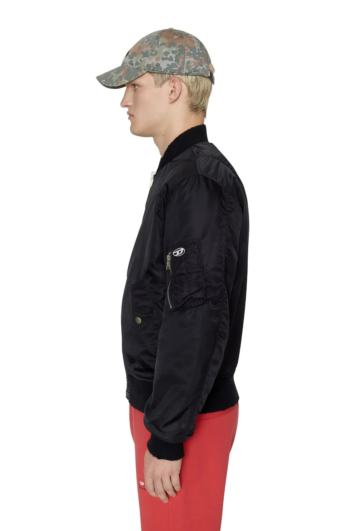 Diesel black bomber jacket, full-zip front and sleeve logo patch, ribbed cuffs.