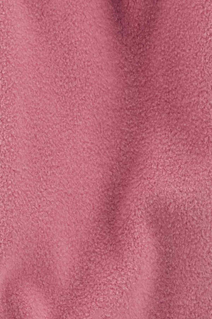 Pink knit fabric close-up with fine texture