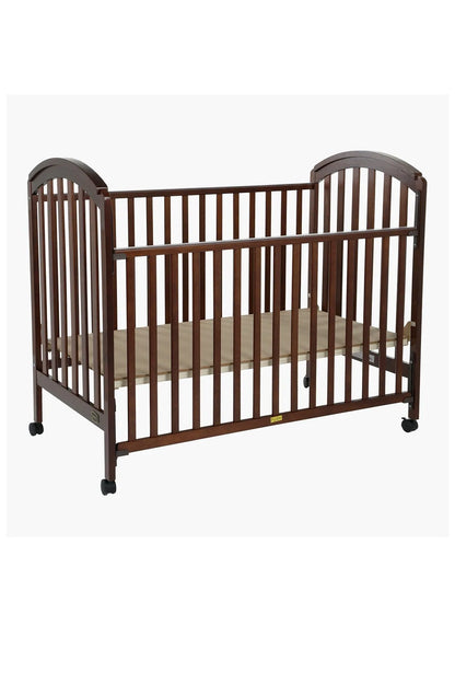 Black and brown wooden baby crib with side slats, low rails, and caster feet