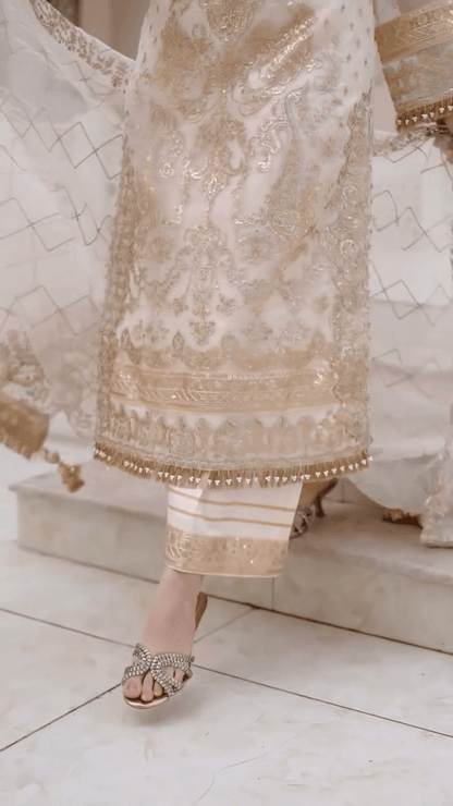 Cream embroidered long tunic with ornate cuffs and sequined neckline, plus matching bottoms