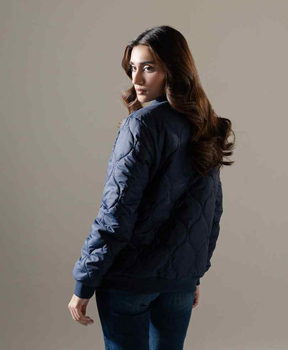 Quilted puffer jacket with stand collar and zip front, visible side pocket