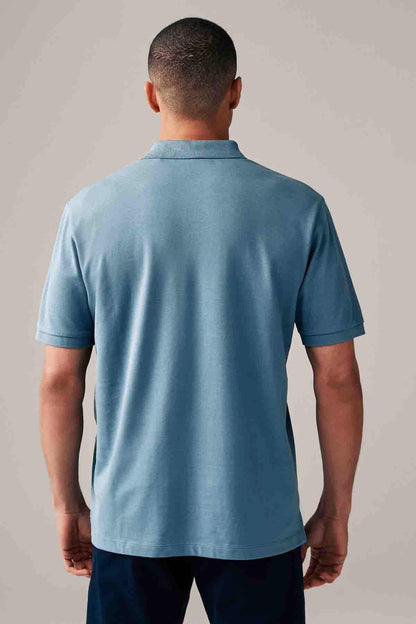 Light blue polo shirt back view with short sleeves and collar