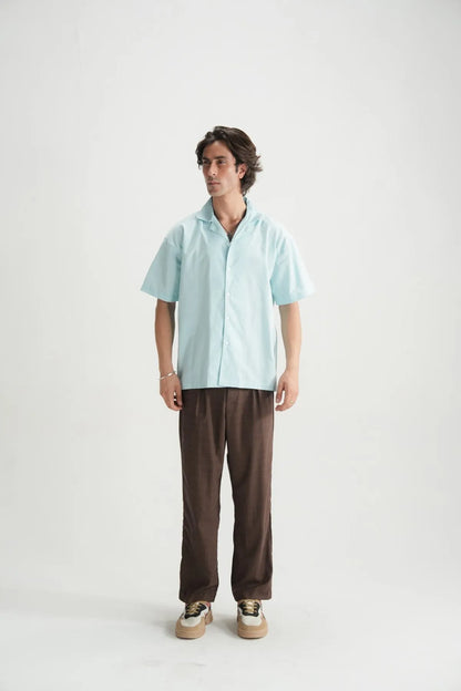 Sky blue short-sleeve button-up shirt, front view