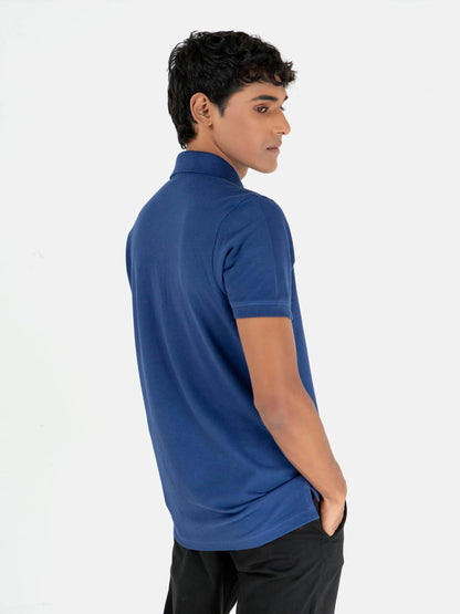 Men's blue cotton polo shirt, short sleeves, side/back view with smooth fabric