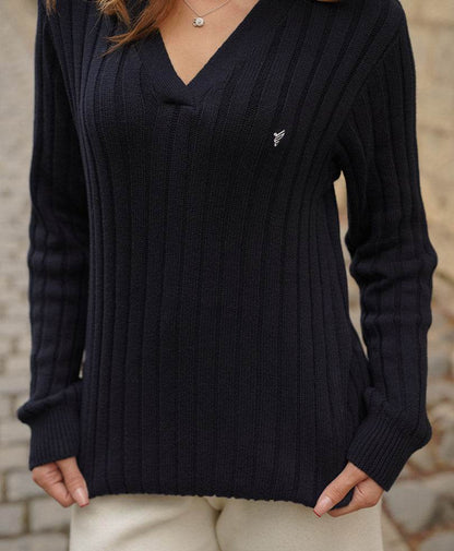Dark navy fitted knit V-neck sweater close-up with small chest logo