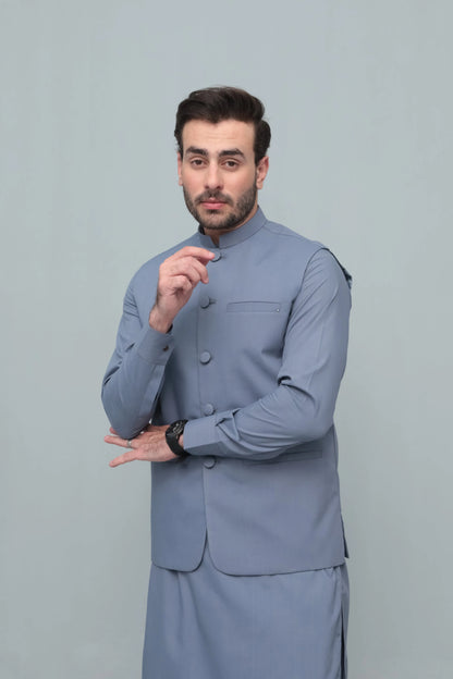Men's light blue waistcoat with stand collar, button placket, and chest pocket