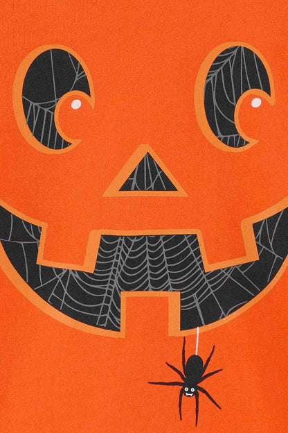 Orange long-sleeve T-shirt close-up: jack-o’-lantern face graphic with spider