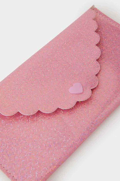 Pink glitter pouch with scalloped edge and heart applique on the trim