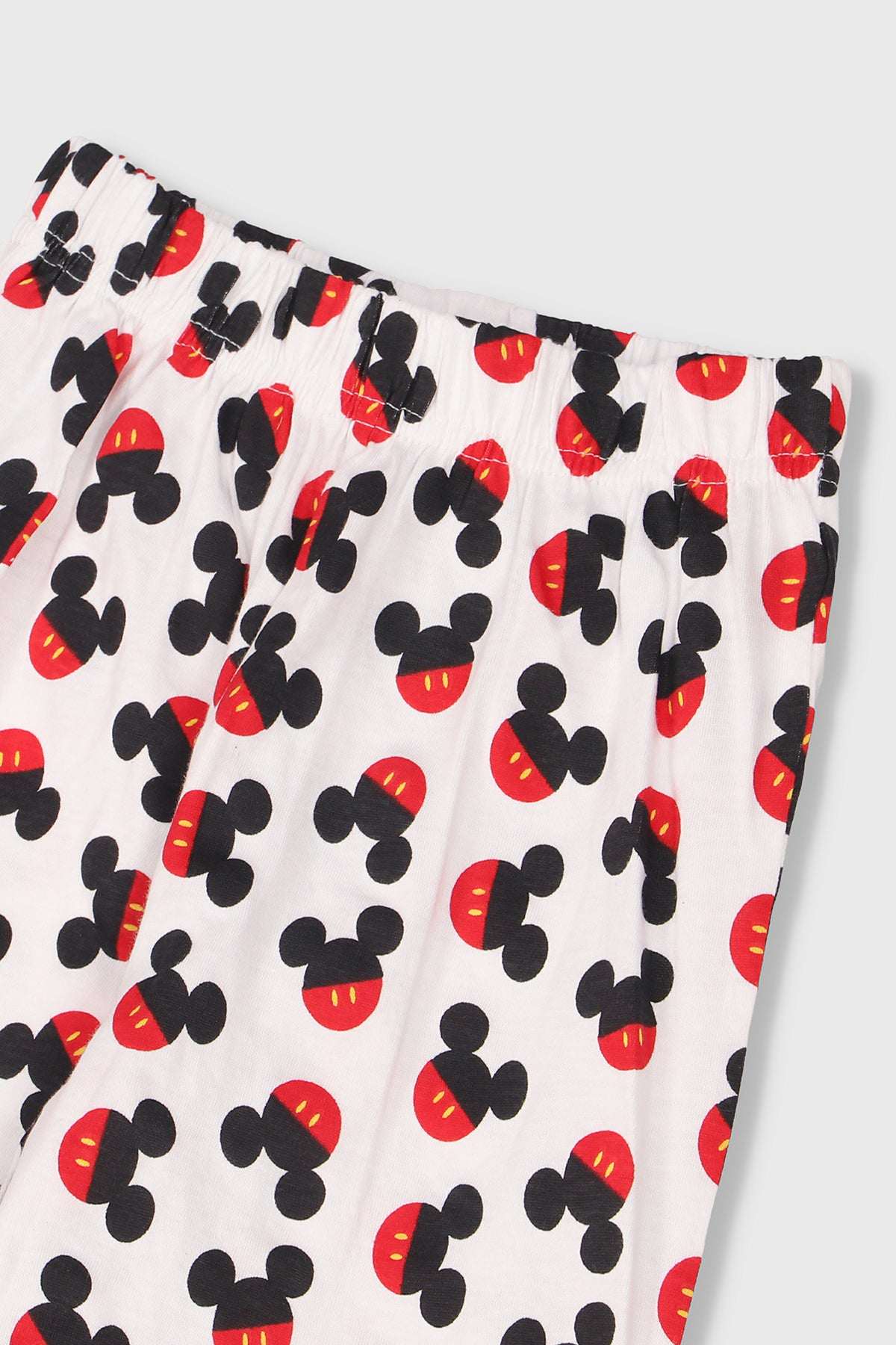 Mickey-themed pajama bottoms with allover strawberry and mouse icon print