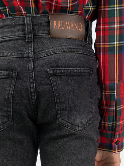 Charcoal denim jeans close-up with Brumano logo patch and front pockets