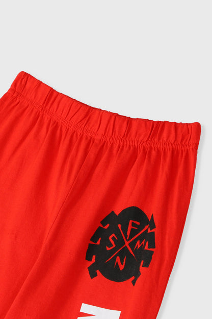 Red Spider-Man pajama pants with black burst logo on leg