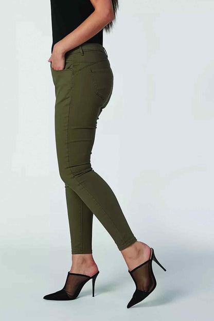 Olive green slim-fit jeans side view with seam stitching and belt loops