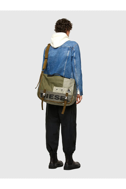 Back-worn duffel bag with orange lining and brown strap details