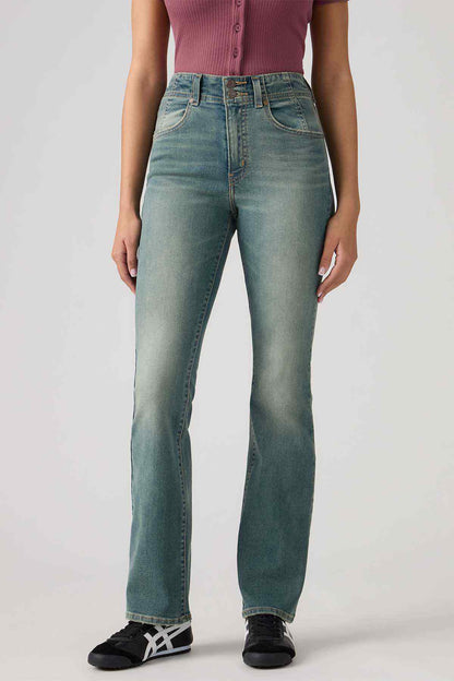 Levi's mid-indigo bootcut jeans with zip fly, contrast stitching, and belt loops