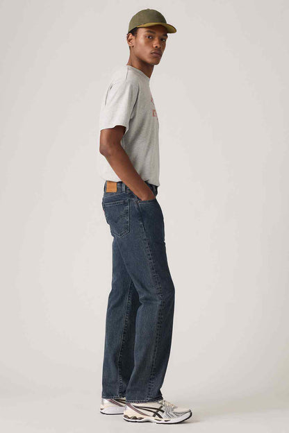 Levi's blue denim jeans side view, relaxed straight-leg silhouette
