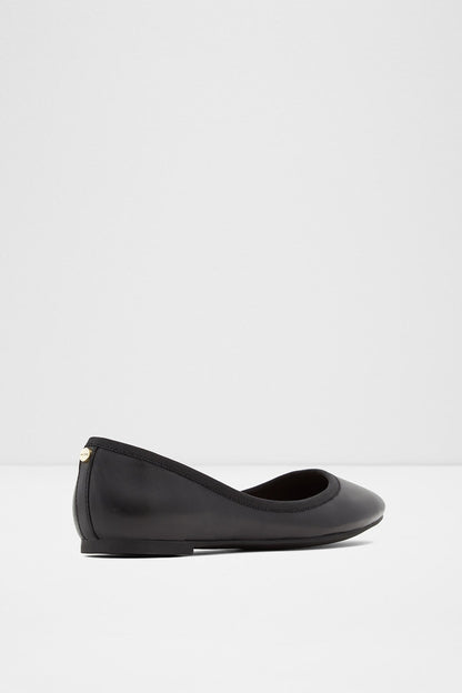 Black slip-on ballet flat with rounded toe and low profile sole, back quarter