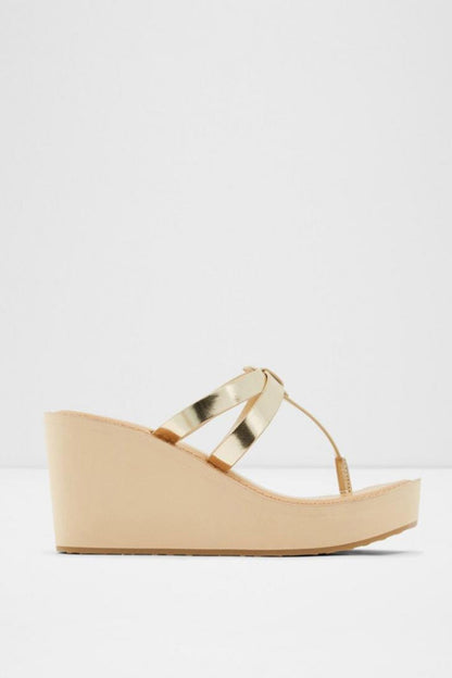 ALDO gold metallic wedge sandals with crisscross straps and open toe