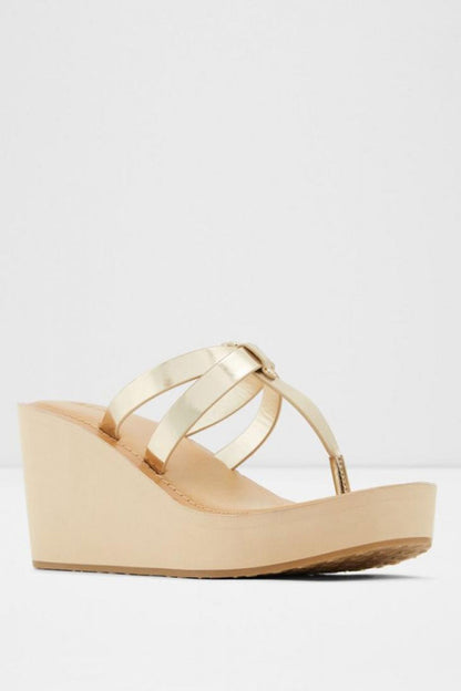 ALDO gold wedge sandals with two wide straps and platform sole
