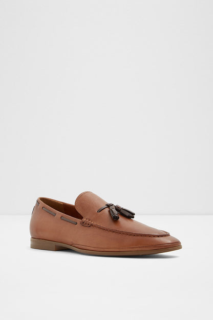 Cognac leather loafer with low heel, moccasin-style front angle