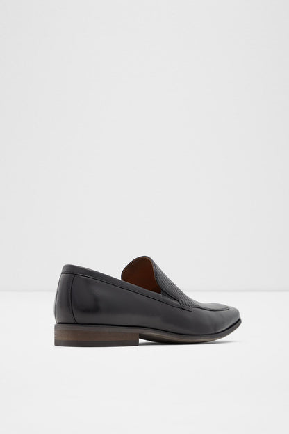 ALDO black leather slip-on loafer with low block heel, brown lining visible