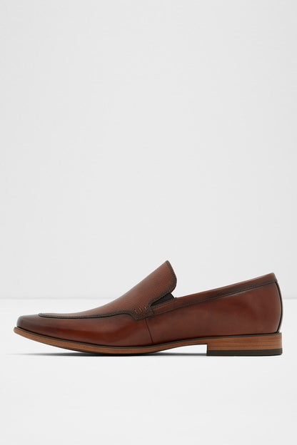 Cognac leather loafer with textured vamp stitching and low block heel