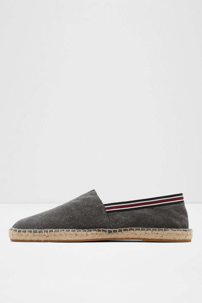 Side view of gray suede espadrille slip-on, jute sole and striped band