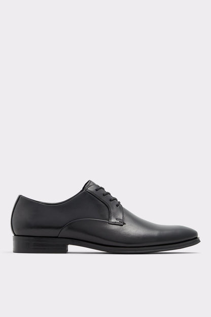 Black leather lace-up oxford shoe with low stacked heel, side view