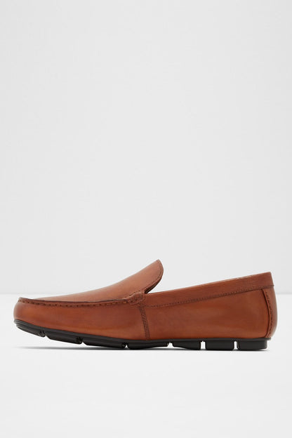 Cognac brown leather loafer, side view, slip-on style with black rubber outsole